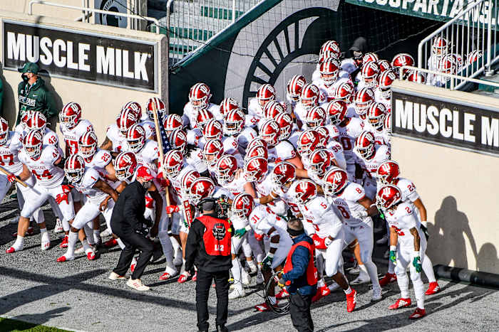 Indiana football runs out of the tunnel at Michigan State